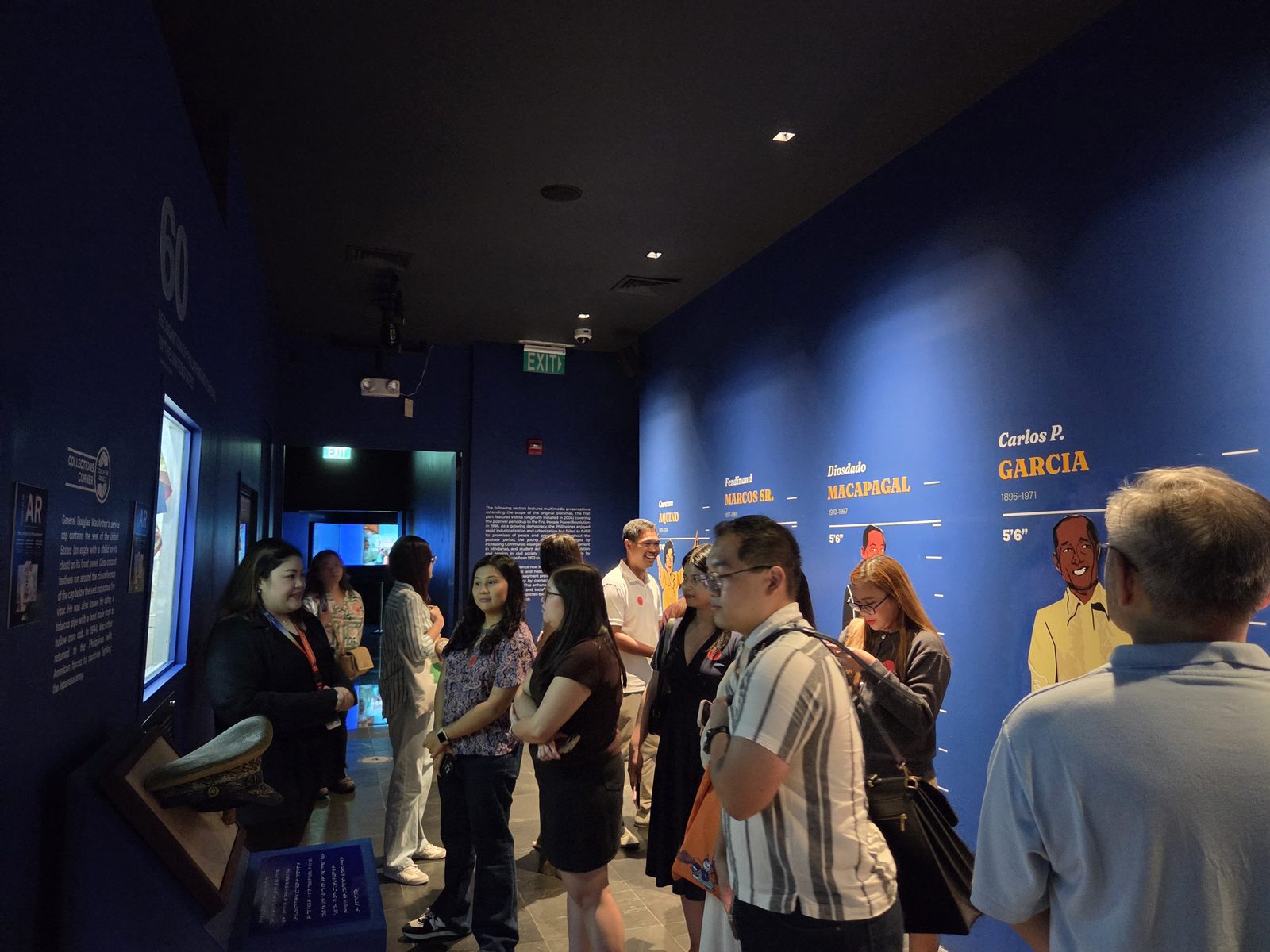 OSL lawyers in the corridor featuring Philippine presidents
